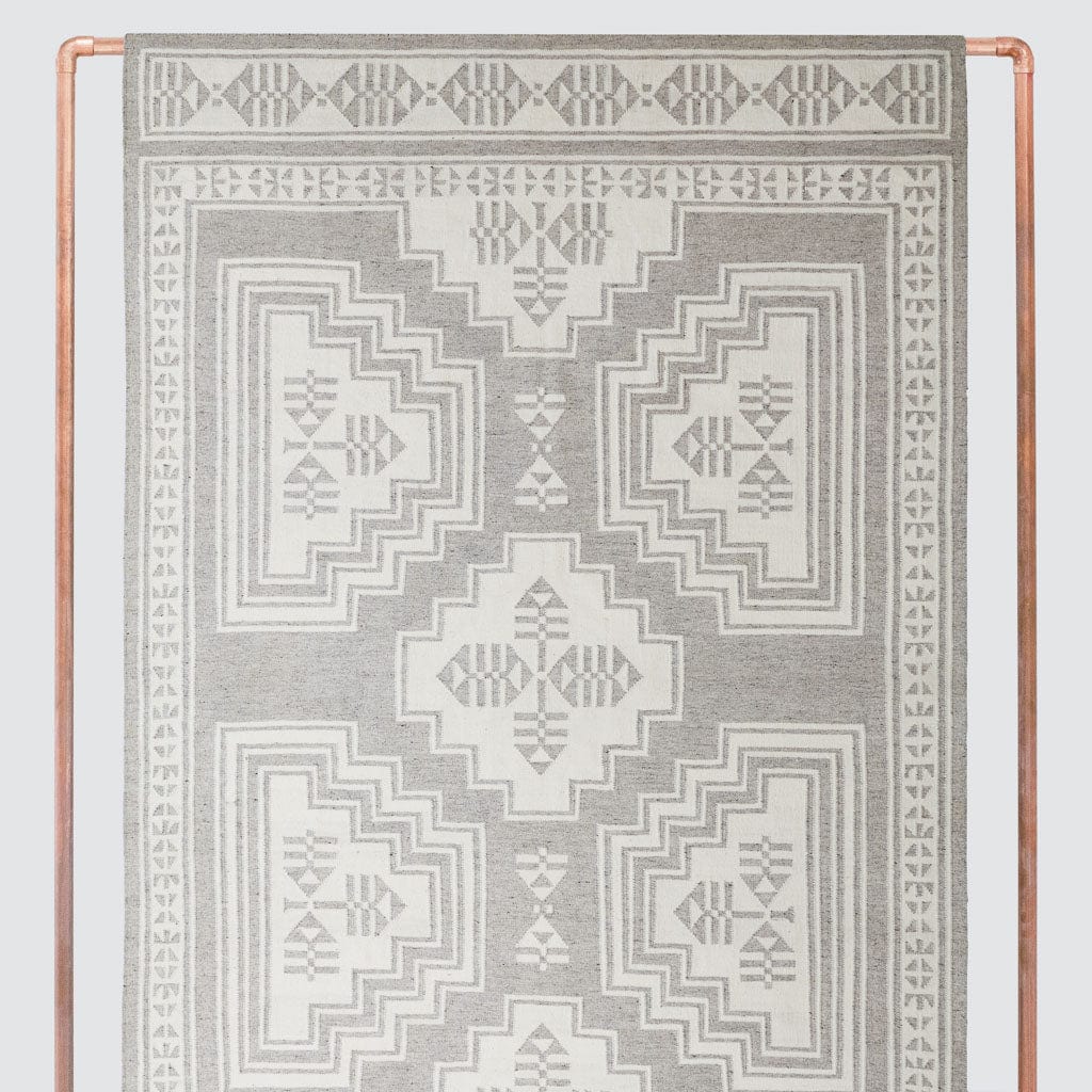 Layered Handwoven Area Rug in Sand - Image 6