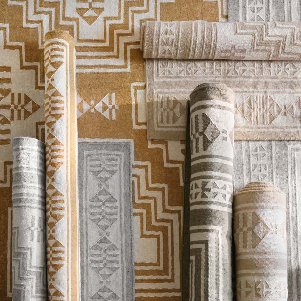 Layered Handwoven Area Rug in Sand - Image 5