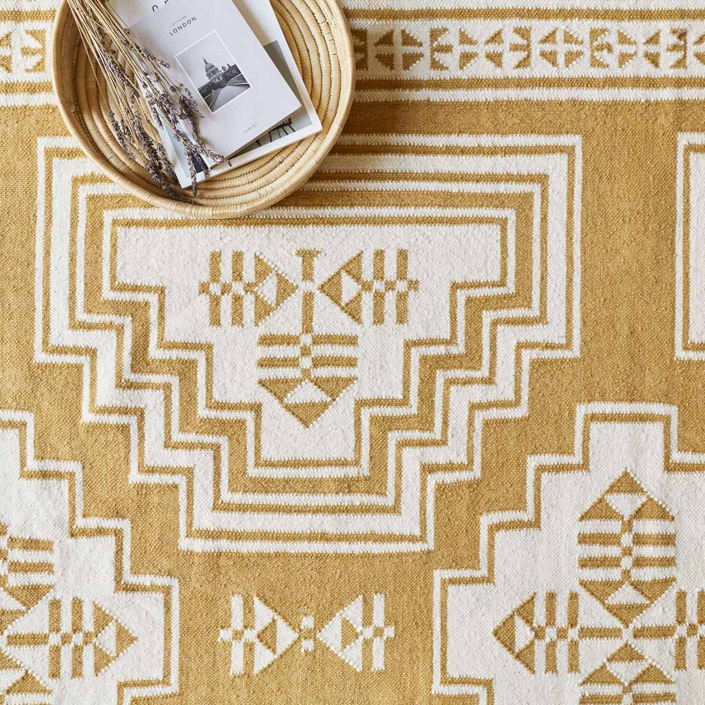 Layered Handwoven Area Rug in Sand - Image 18