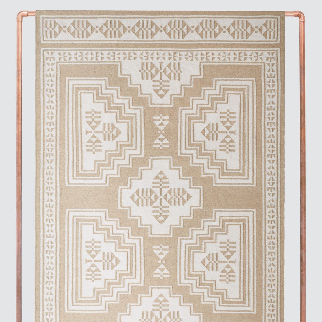 Layered Handwoven Area Rug in Sand
