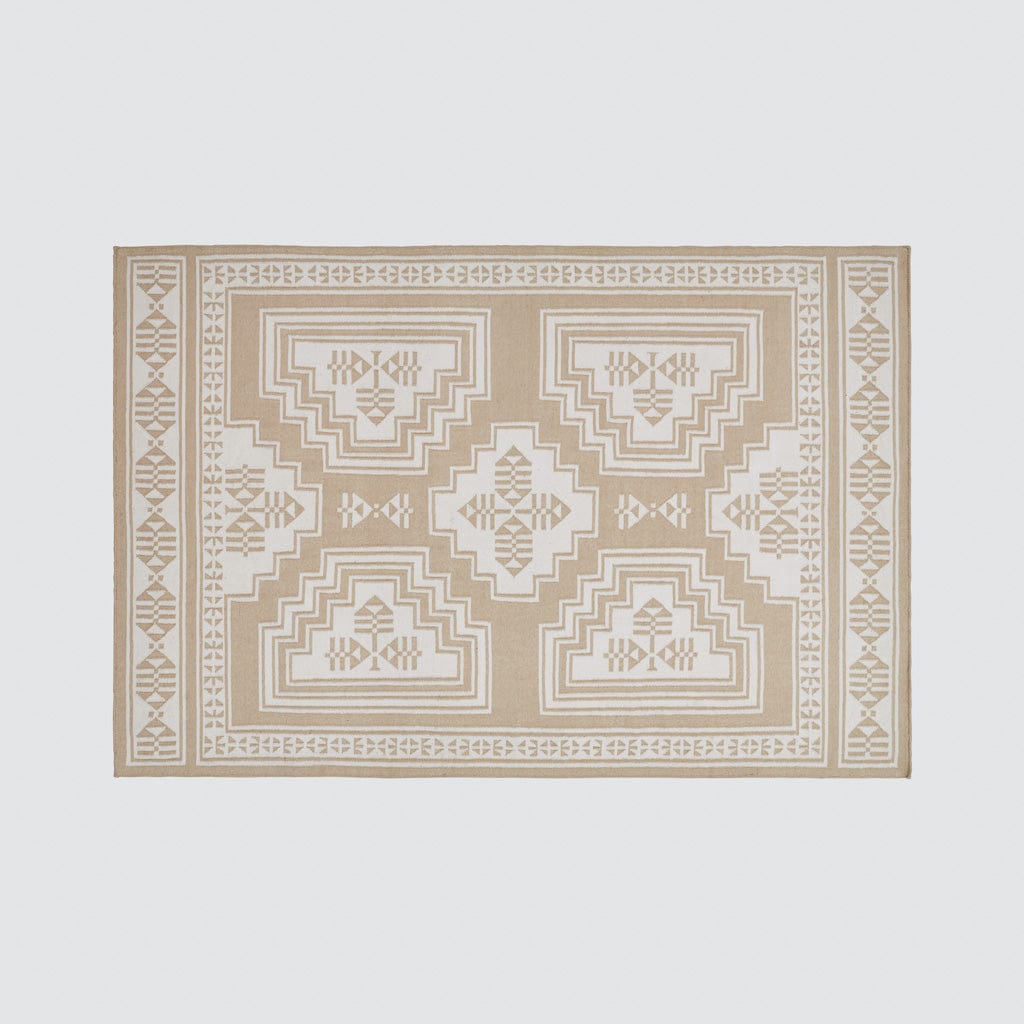 Layered Handwoven Area Rug in Sand - Image 4